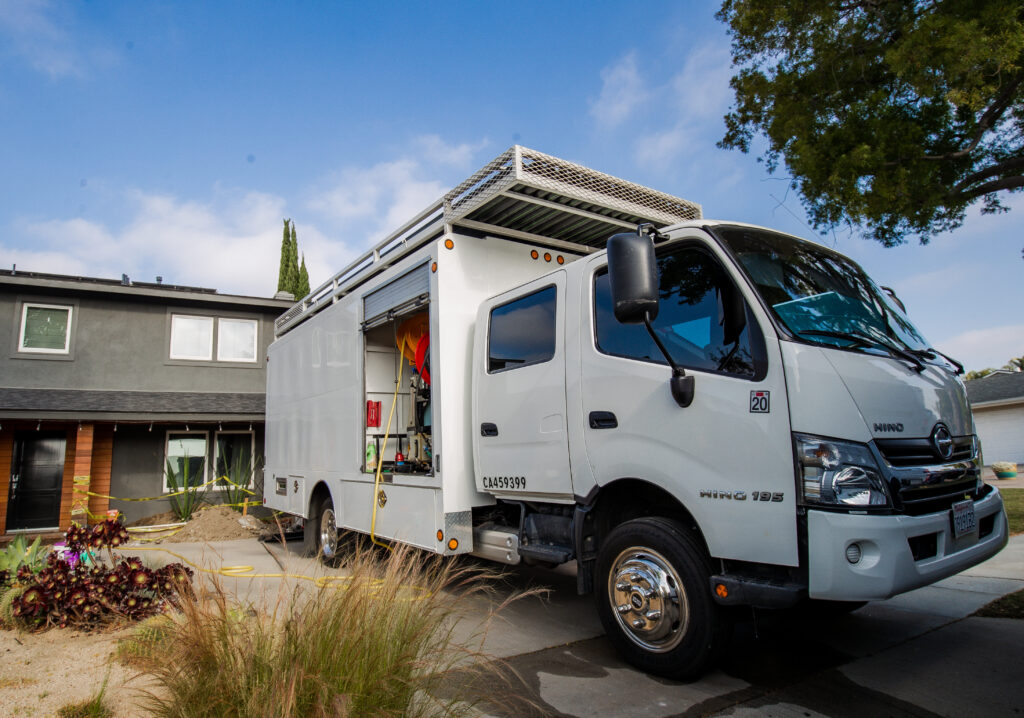 V-Max Plumbing technician on a residential service call in Southern California.