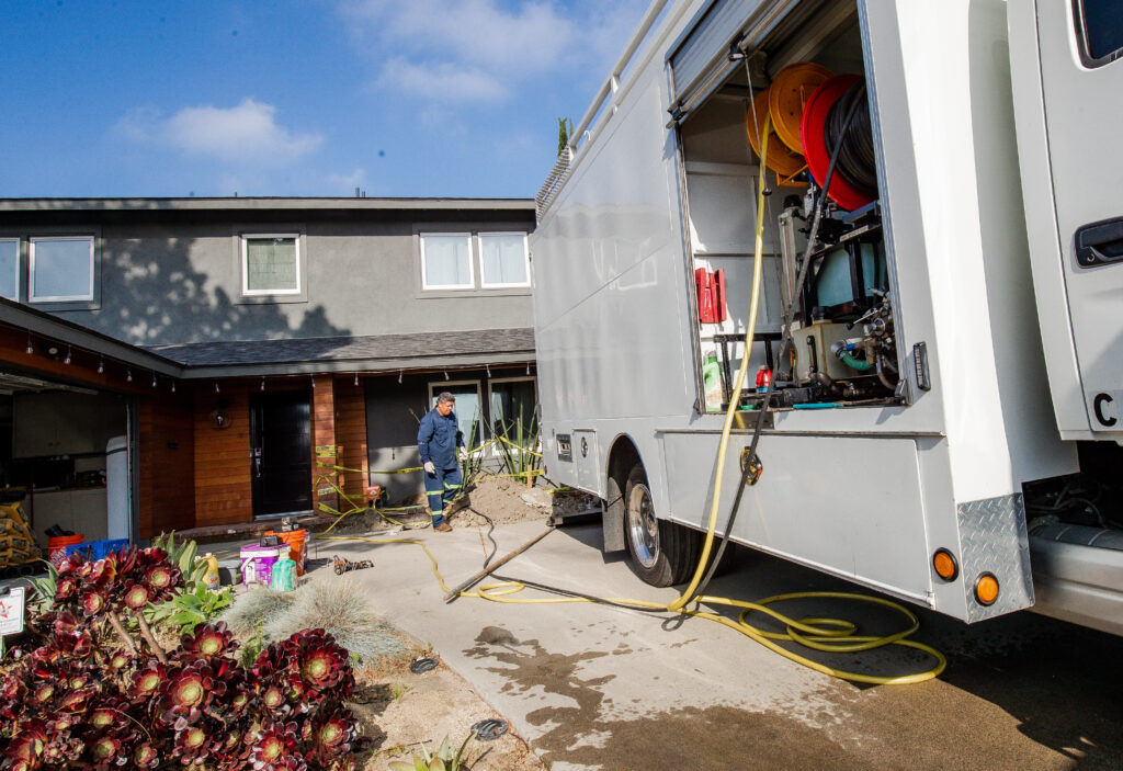 V-Max Plumbing technician on a residential service call in Southern California.